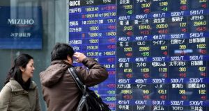 Asian Shares Fall as Trump Tariffs Get Temporary Reprieve, Fueling Trade Uncertainty
